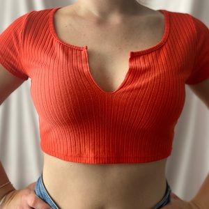 Reddish orange crop top